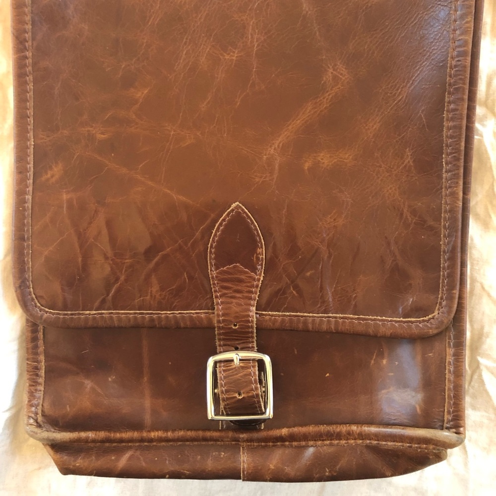 Vintage genuine leather crossbody buckle bag.